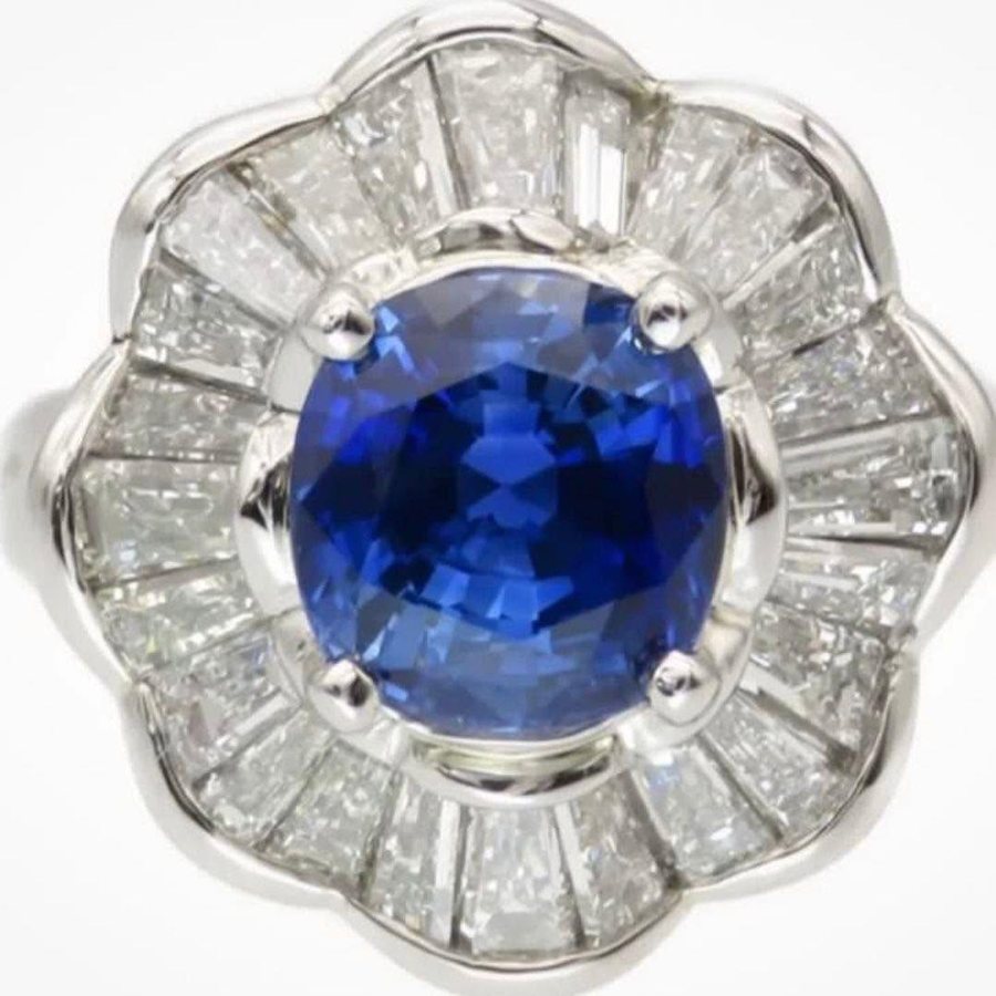 Blue sapphire and diamond cluster ring