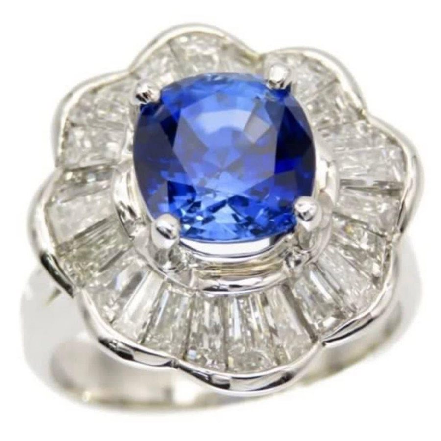 Blue sapphire and baguette diamond flower ring
